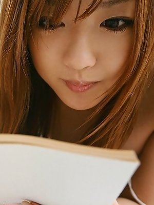 Adorable Asian teen is lovely as she is exposing her nice tits and tight ass