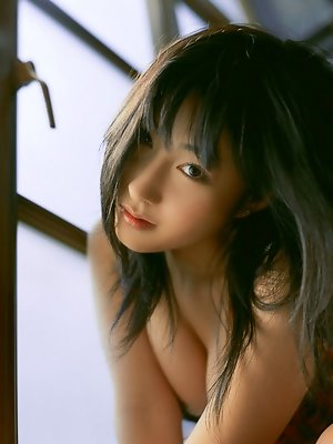 Luscious gravure idol with soft plump boobs in tight lingerie