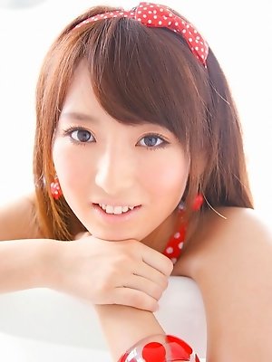 Yukari Sato looks incredibly cute in her skimpy blue bikini