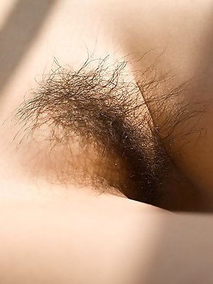 Kanako Tsuchiya hot Asian teen model shows off her hairy pussy