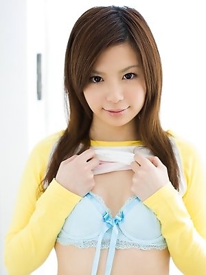 Adorable Asian model has nice legs and nice big tits she shows off